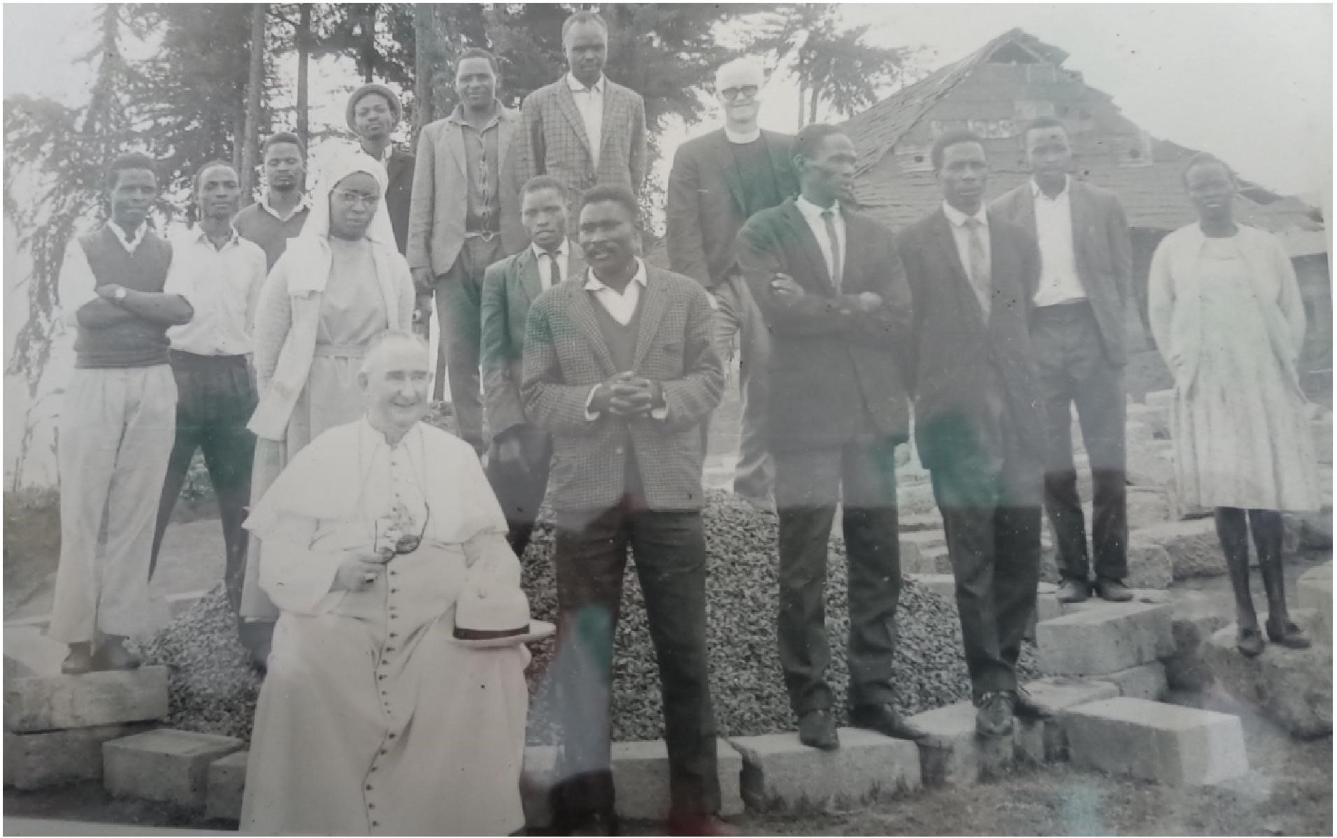 Photo Description: Sister Martin, Father Cunningham (Bishop), Christopher Gatuma, Laban Njoroge